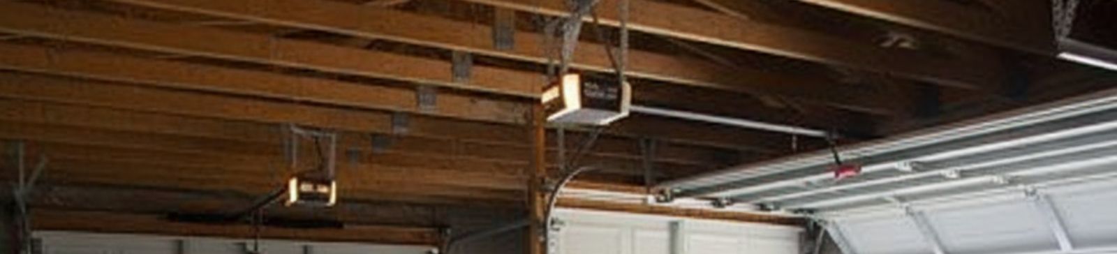 Garage door repair service in Bloomfield NJ showing door reinstallation and track adjustment