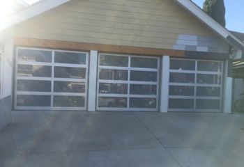 Newly installed triple glass garage doors on Belleville NJ home